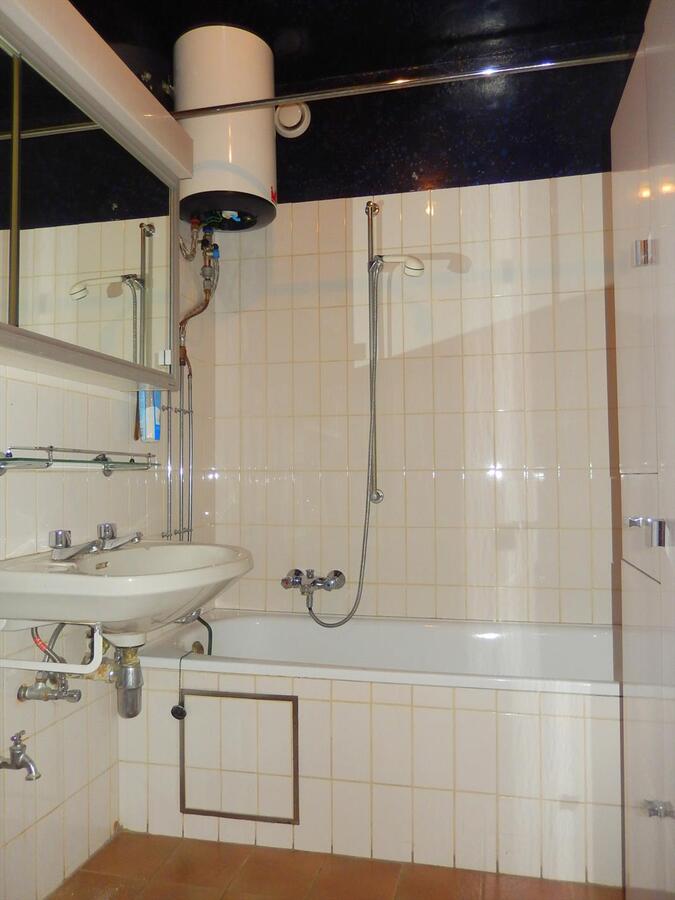 Drieslaapkamer appartement met zicht op de markt van Gistel 