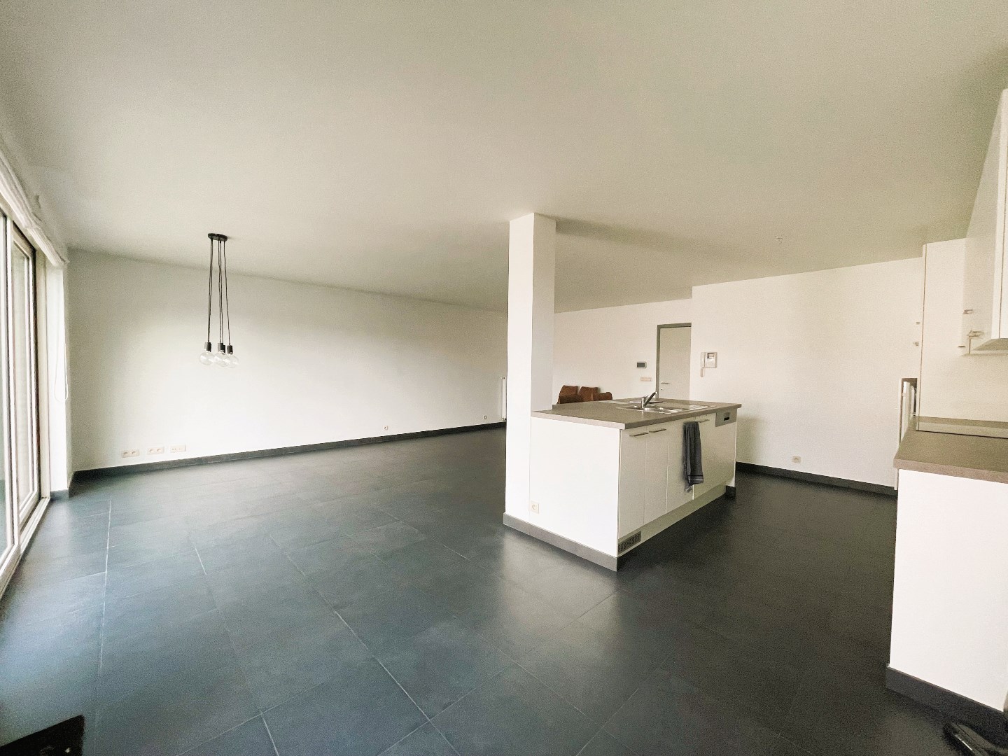 Gelijkvloers appartement met 2 slaapkamers en aangename tuin 