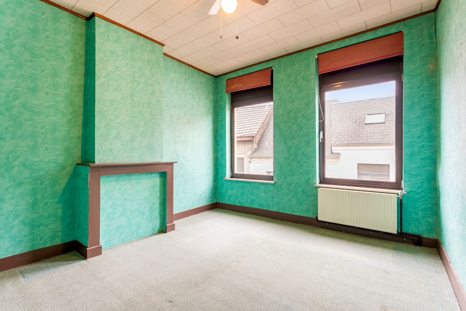 Handelspand met woonst te Halle-centrum 