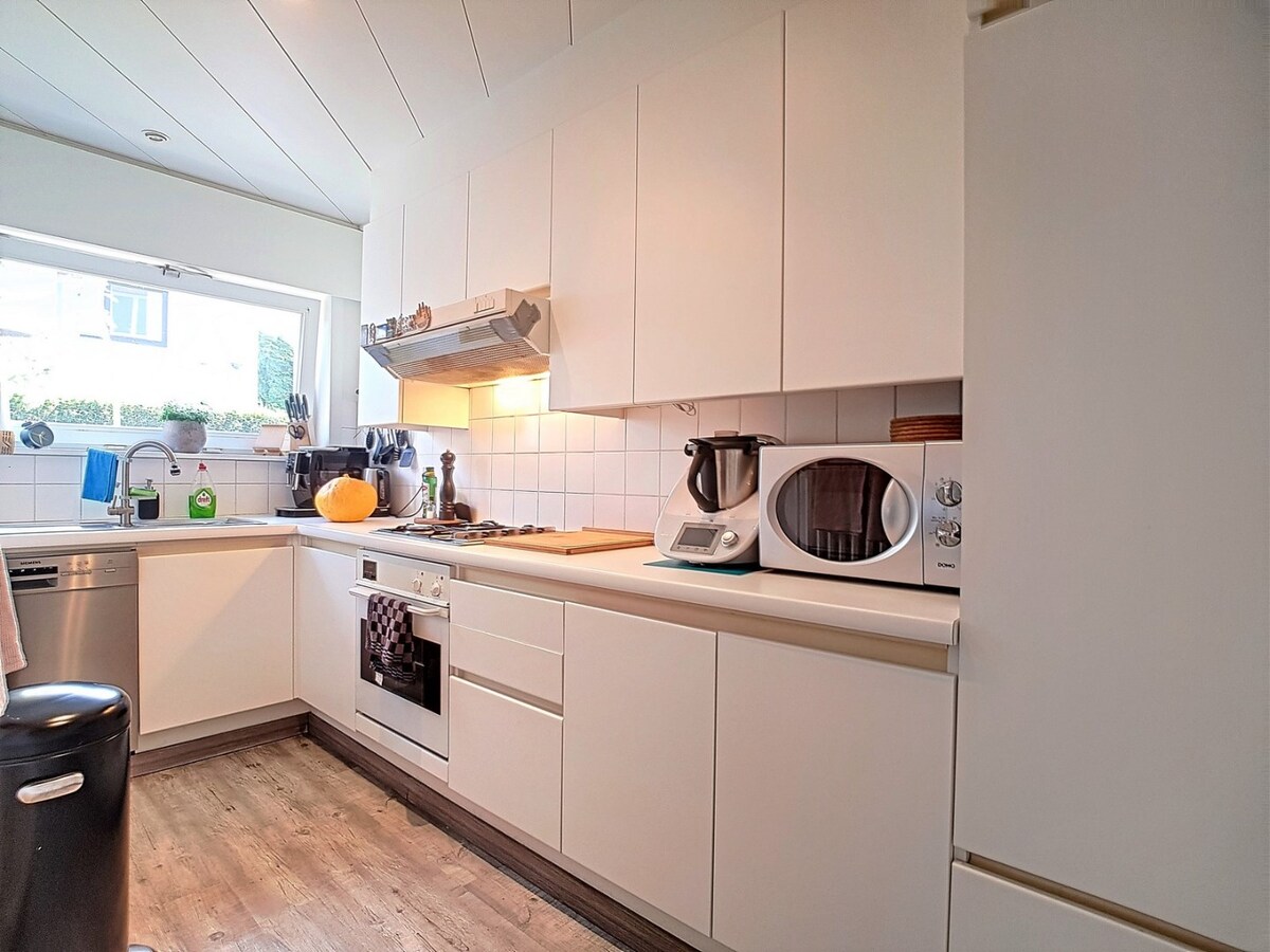 Hoekappartement met tuin en garage - Heist 