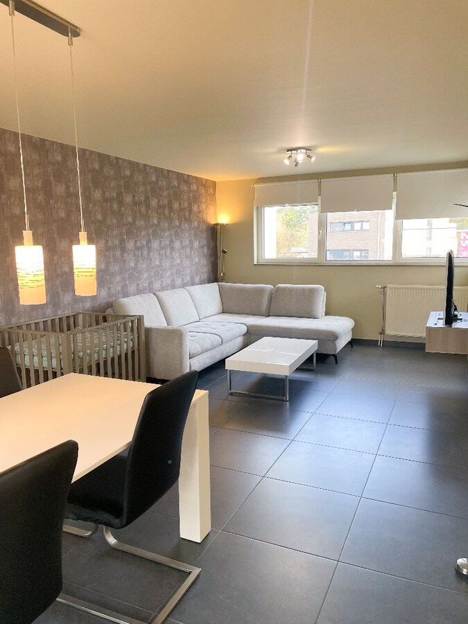 Verzorgde bel-etagewoning met 3 slpk, terras, patio  en garage nabij het centrum van As. 