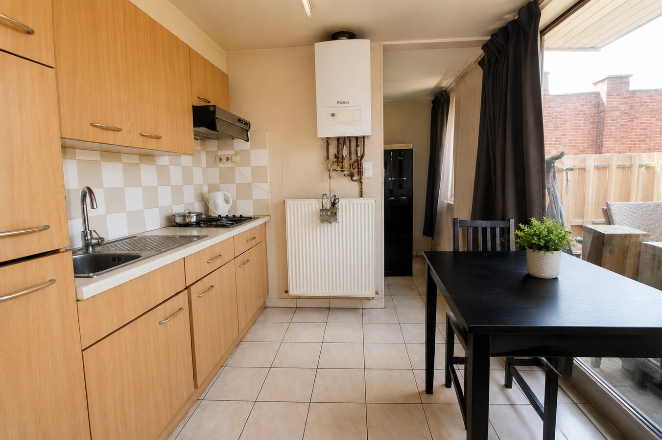 Interessante investeringsopportuniteit: opbrengsteigendom met drie appartementen in Sint-Niklaas 