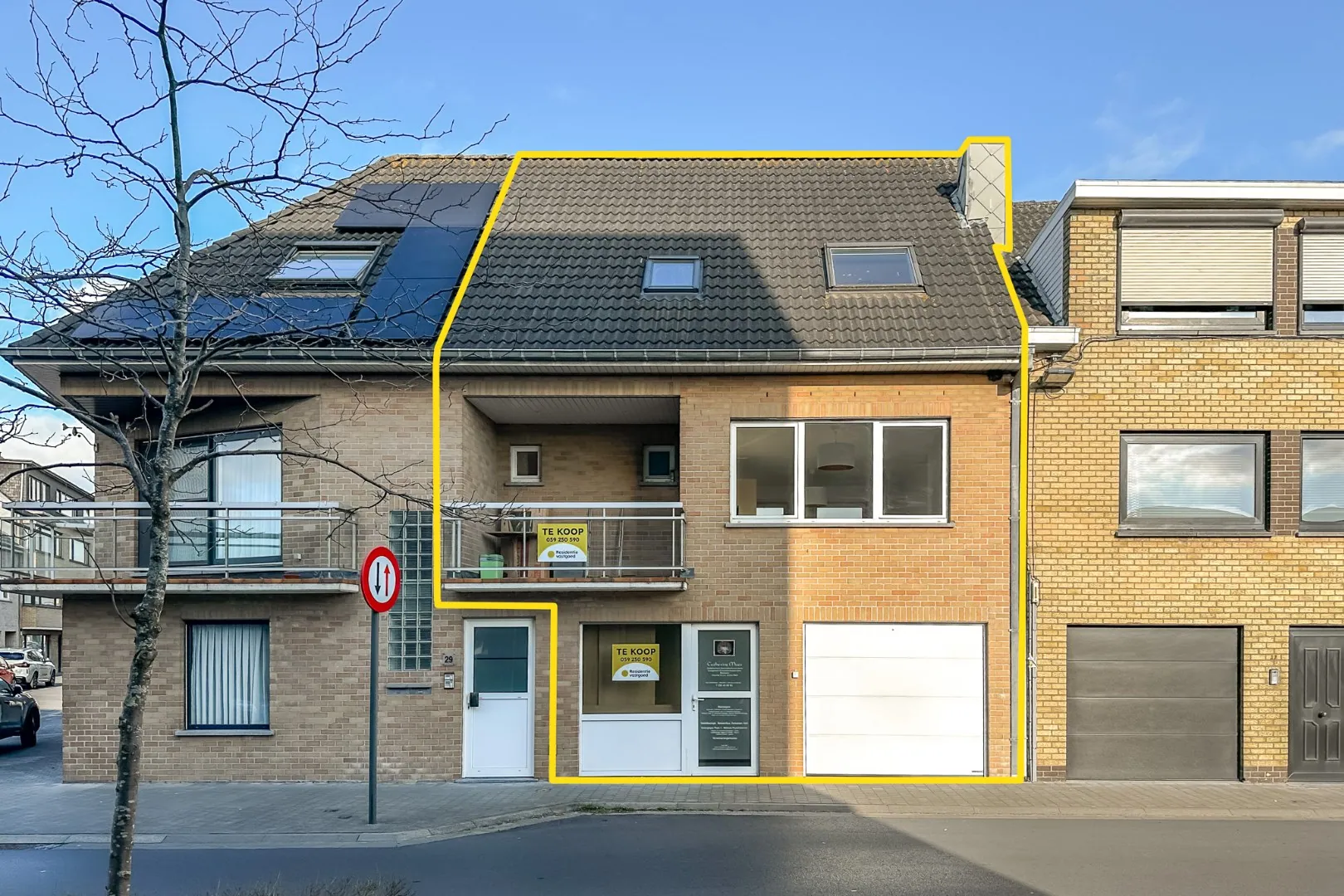 Ruim duplex appartement met 3 slaapkamers, garage en handelsruimte