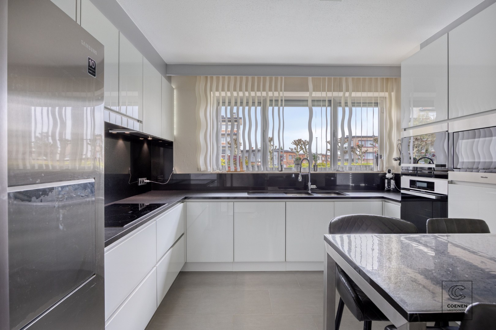 Ruim appartement met 3 slpk en schitterende tuin te Merksem! 