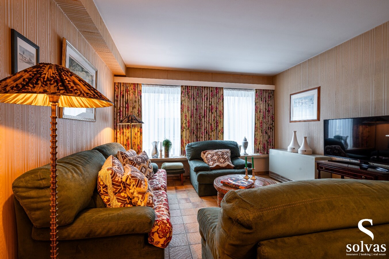 Gebouw met 4 appartementen en 2 handelspanden in centrum Maldegem 