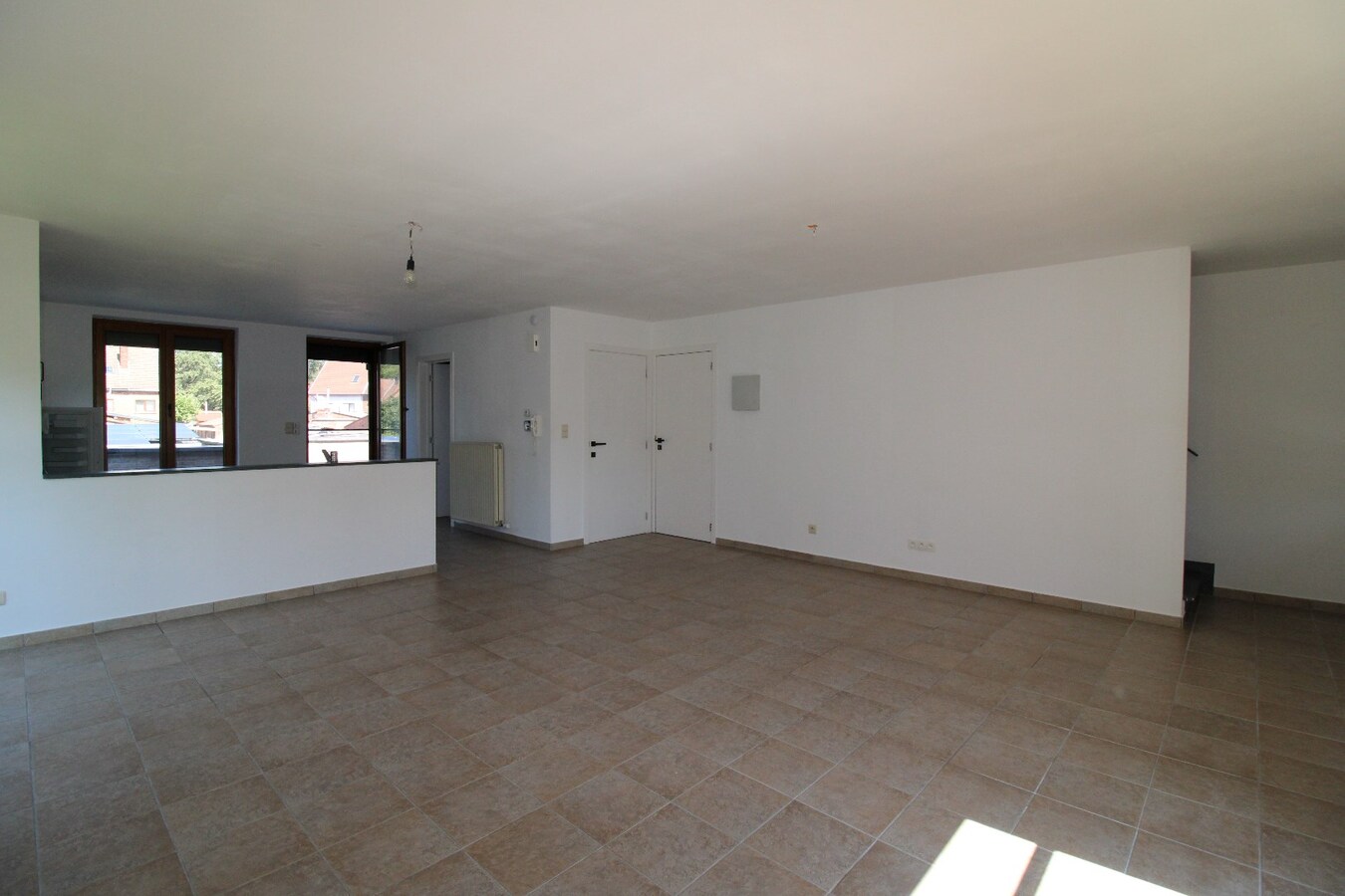 Ruim duplex appartement met mooi terras en garage 