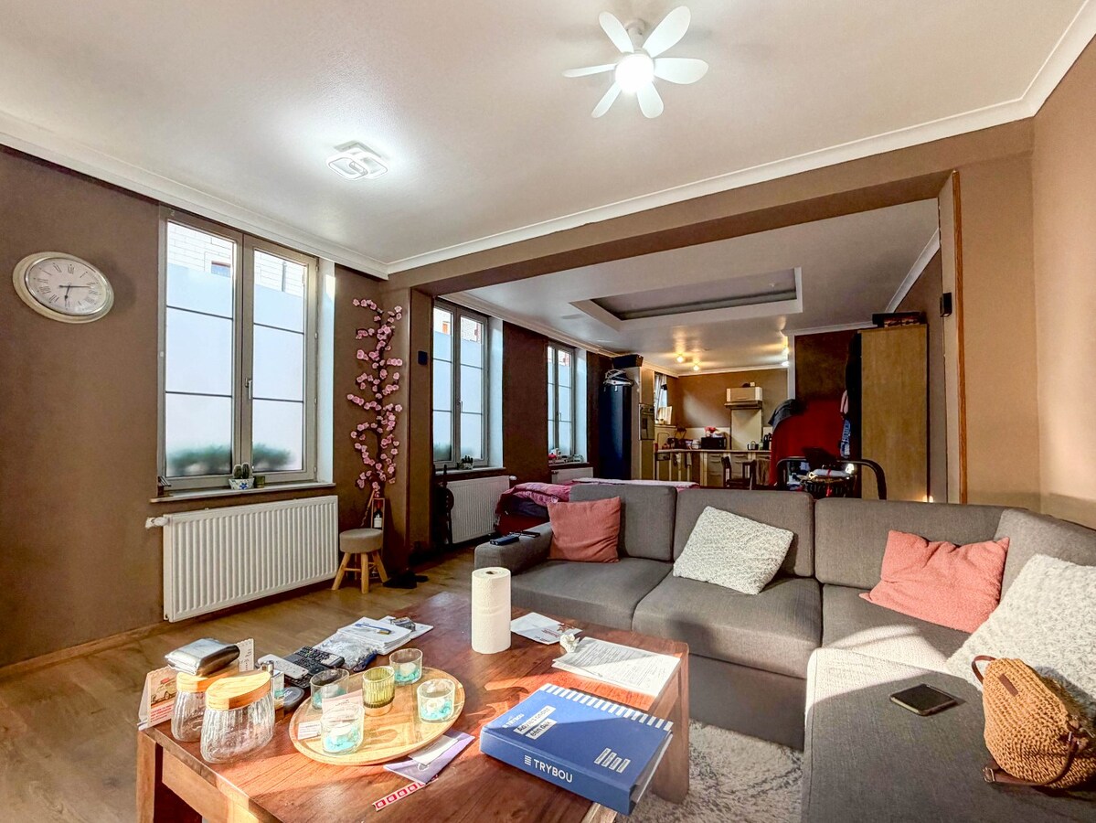 UNIEK en ruime KARAKTERVOLLE  woning met handelspand nabij de Grote Markt ! 