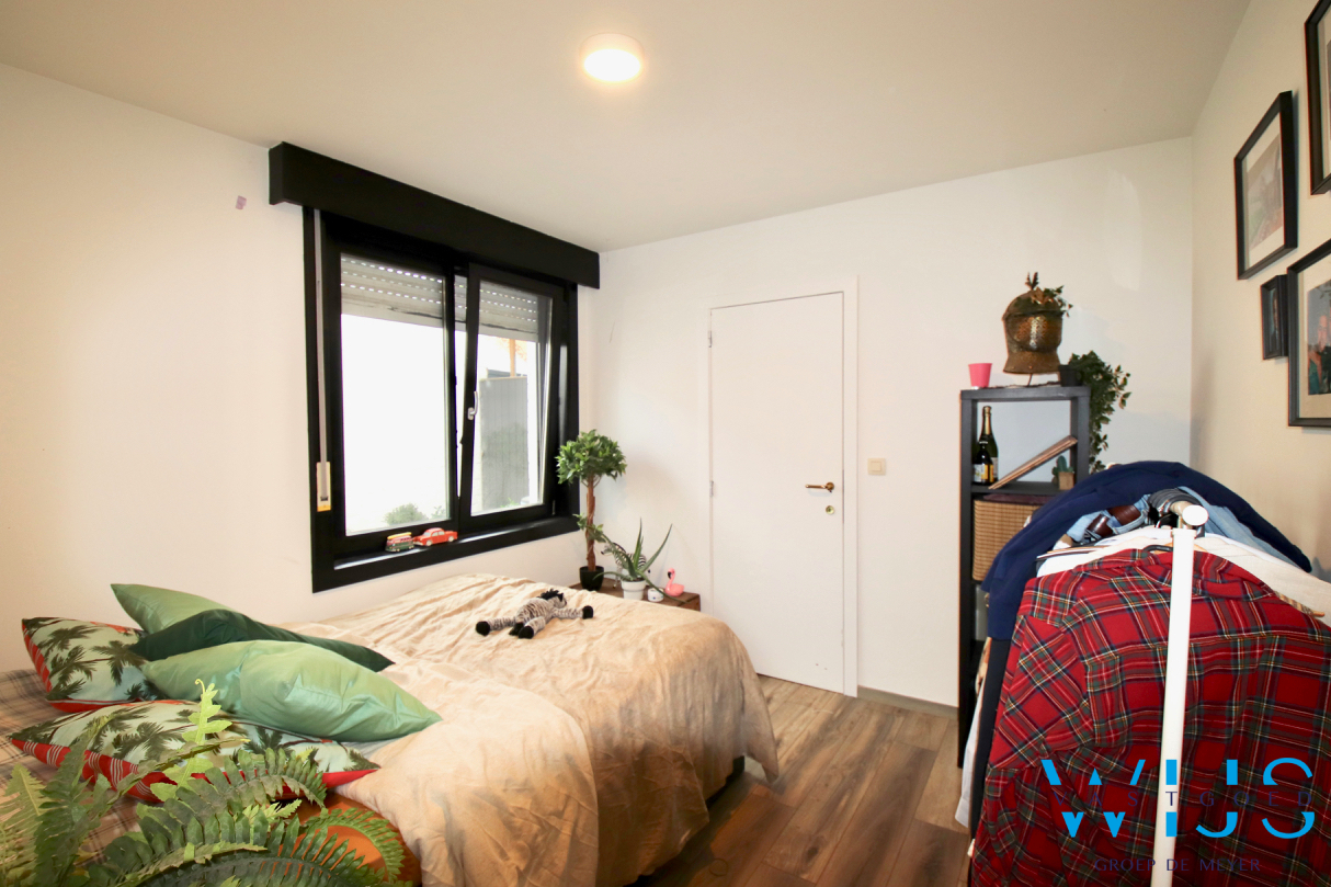 Instapklaar gelijkvloers appartement met 1 slaapkamer &amp; binnenkoer te ASSENEDE! 