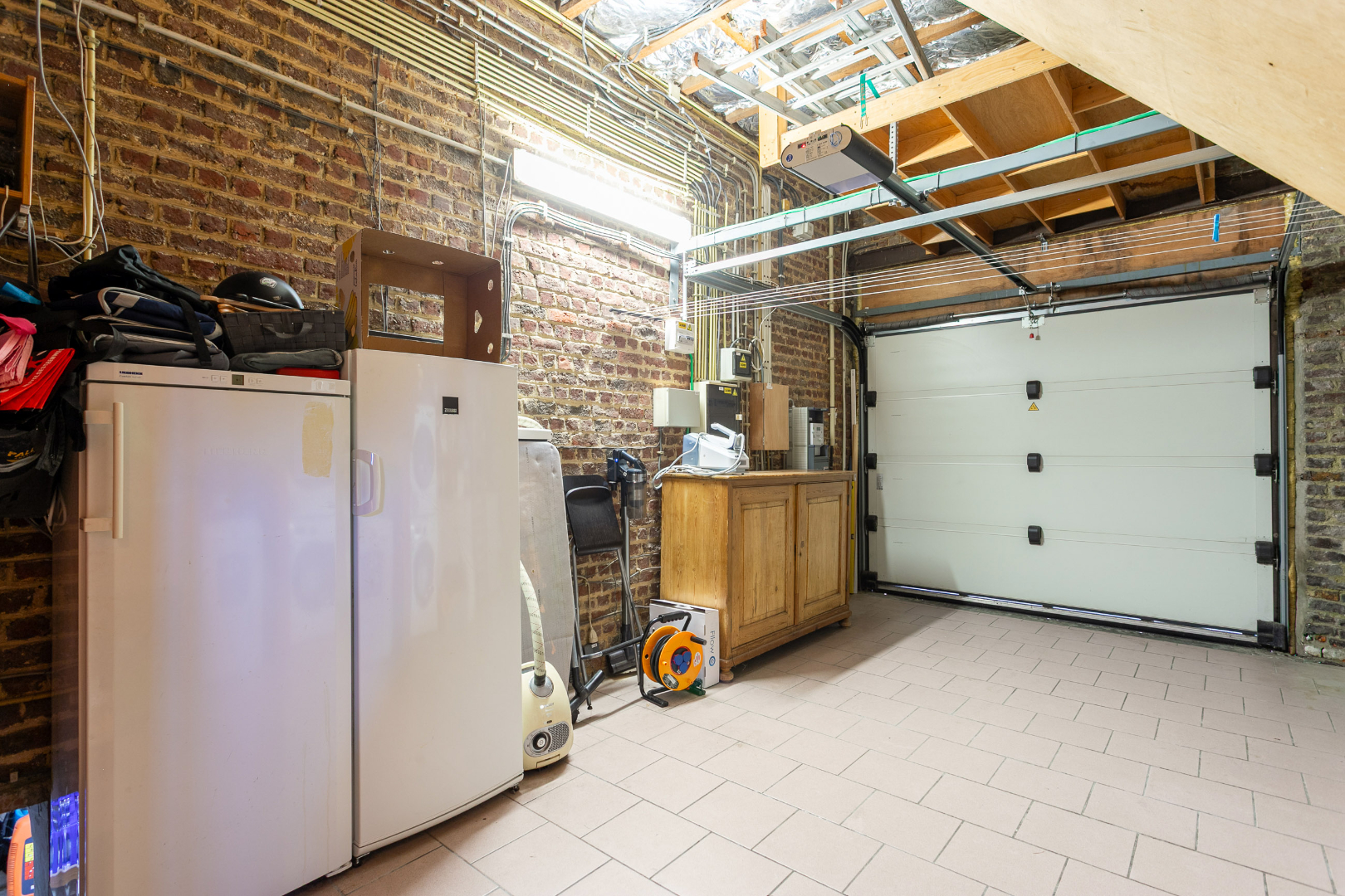 Instapklare driegevelwoning met 4 slpk te Lembeek 