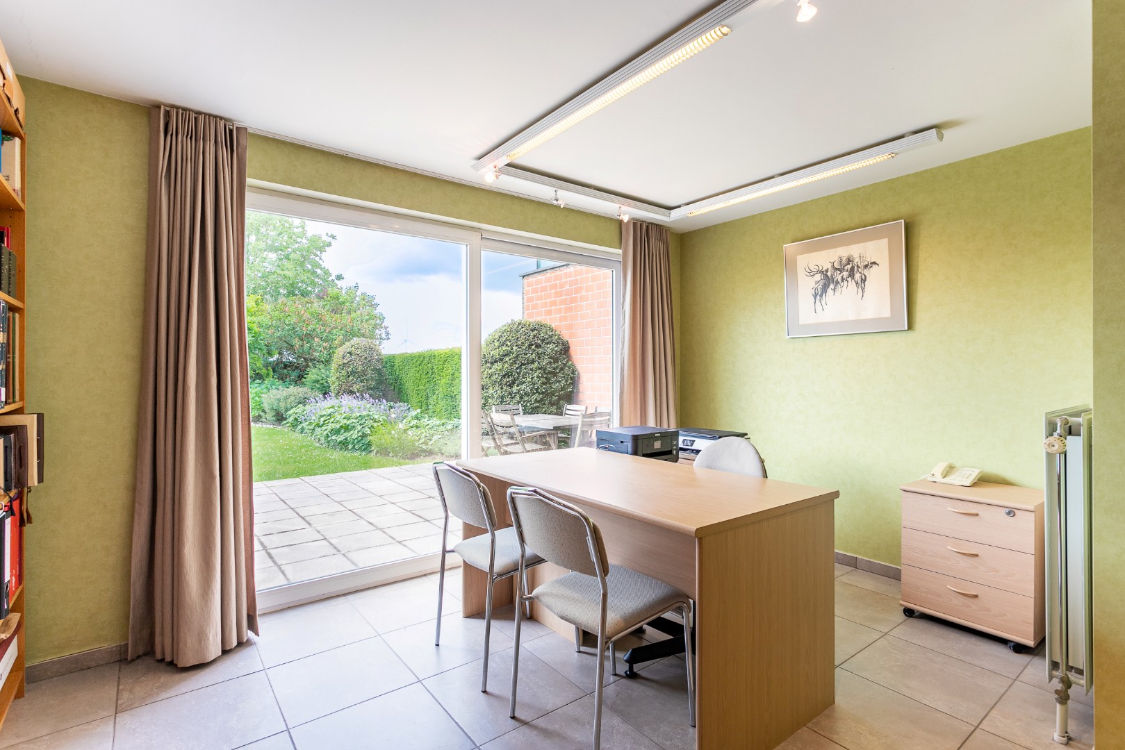 Verzorgde 3-gevelwoning met 3 slpk en tuin te Halle 
