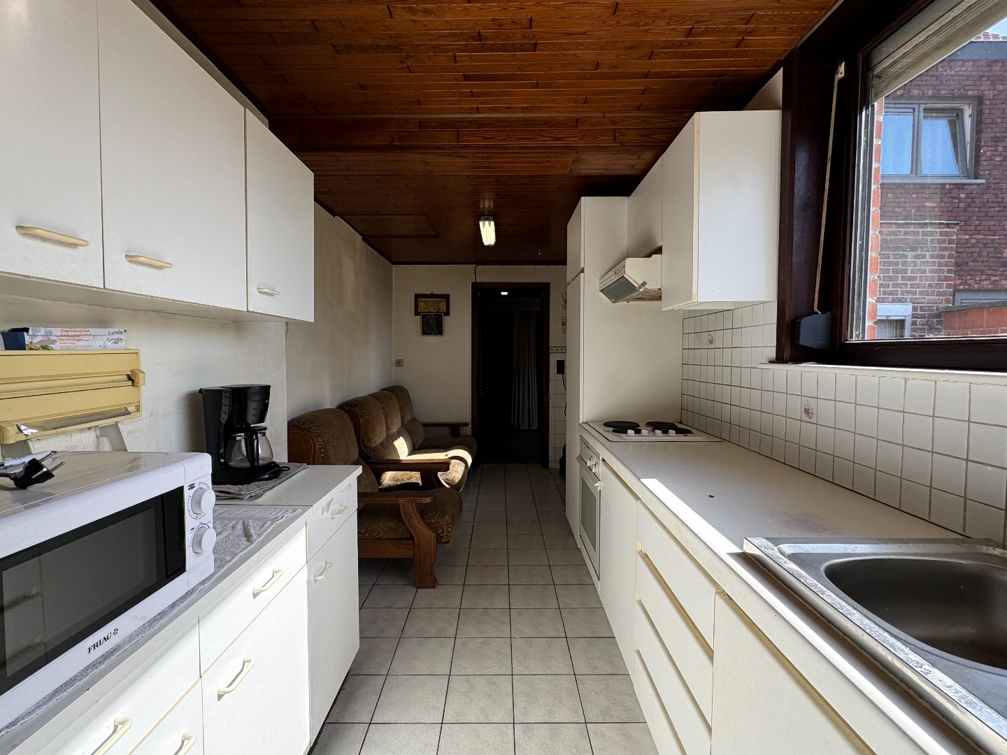 Gezellige woning met stadstuin, garage en uitweg langsachter. 