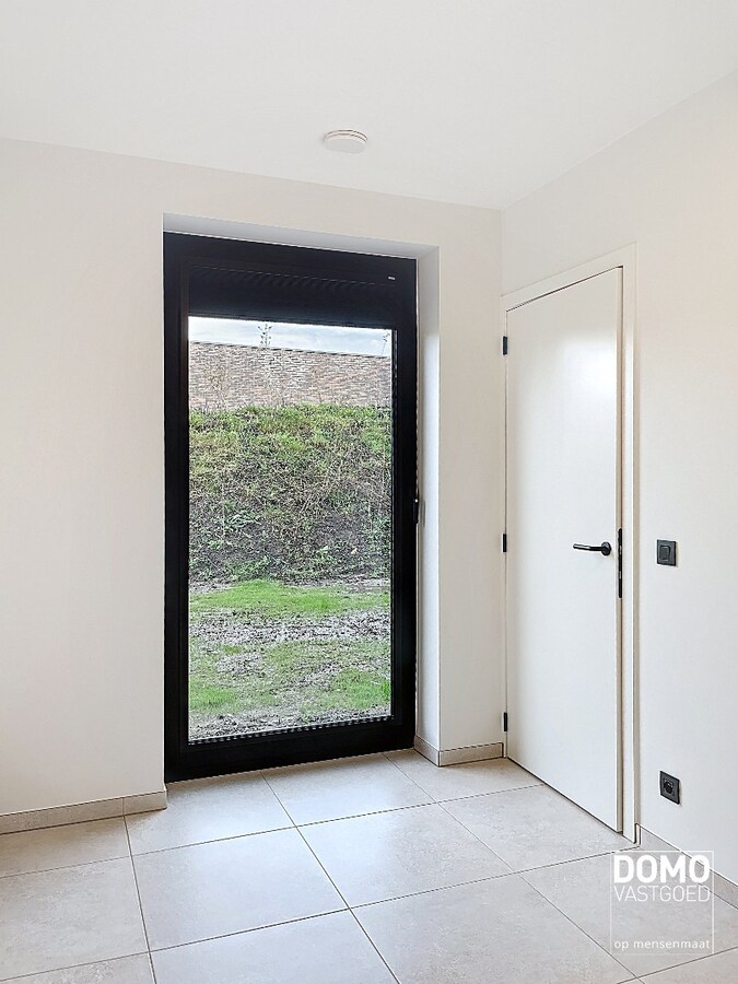 Modern gelijkvloers appartement gelegen te Kermt - 2 slaapkamers - energiezuinig - ruim terras 
