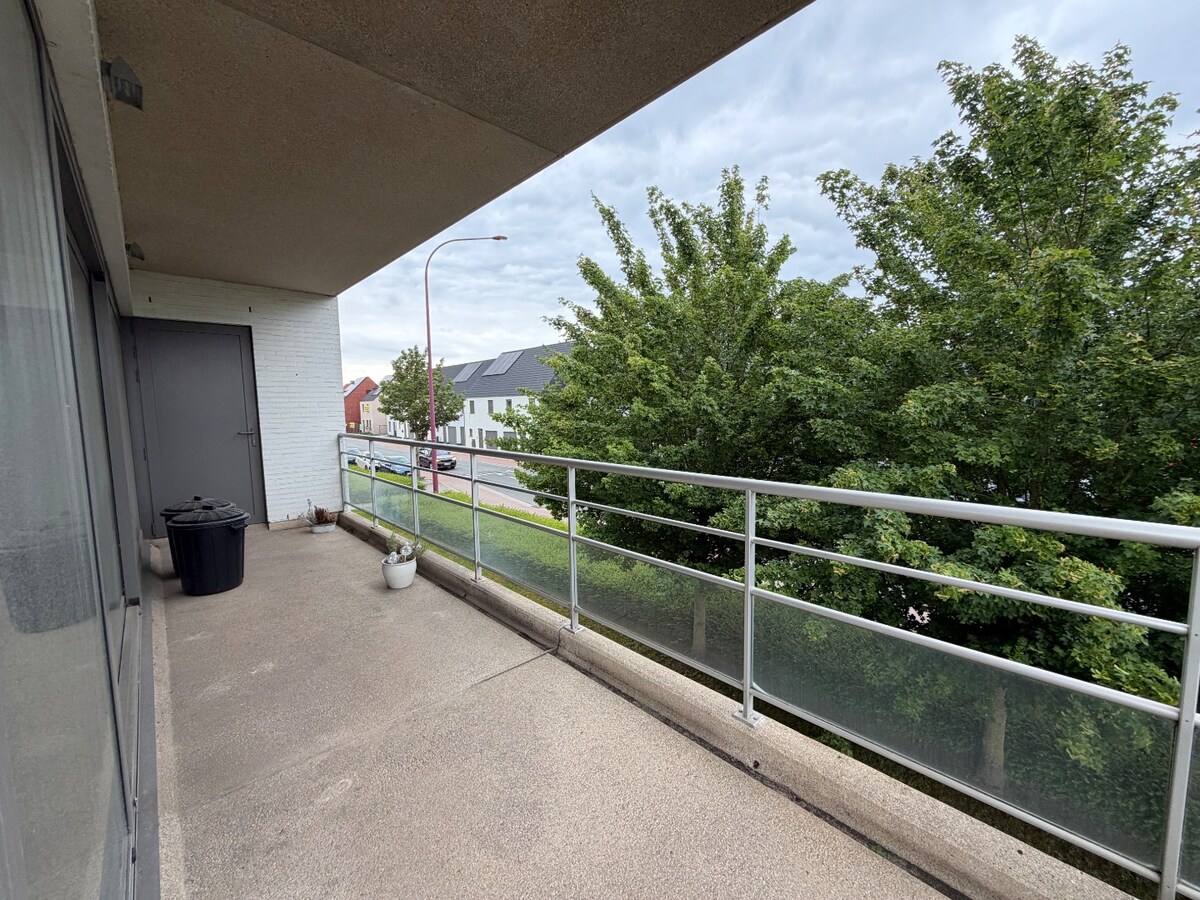 2 slpk-appartement nabij allerhande voorzieningen. 
