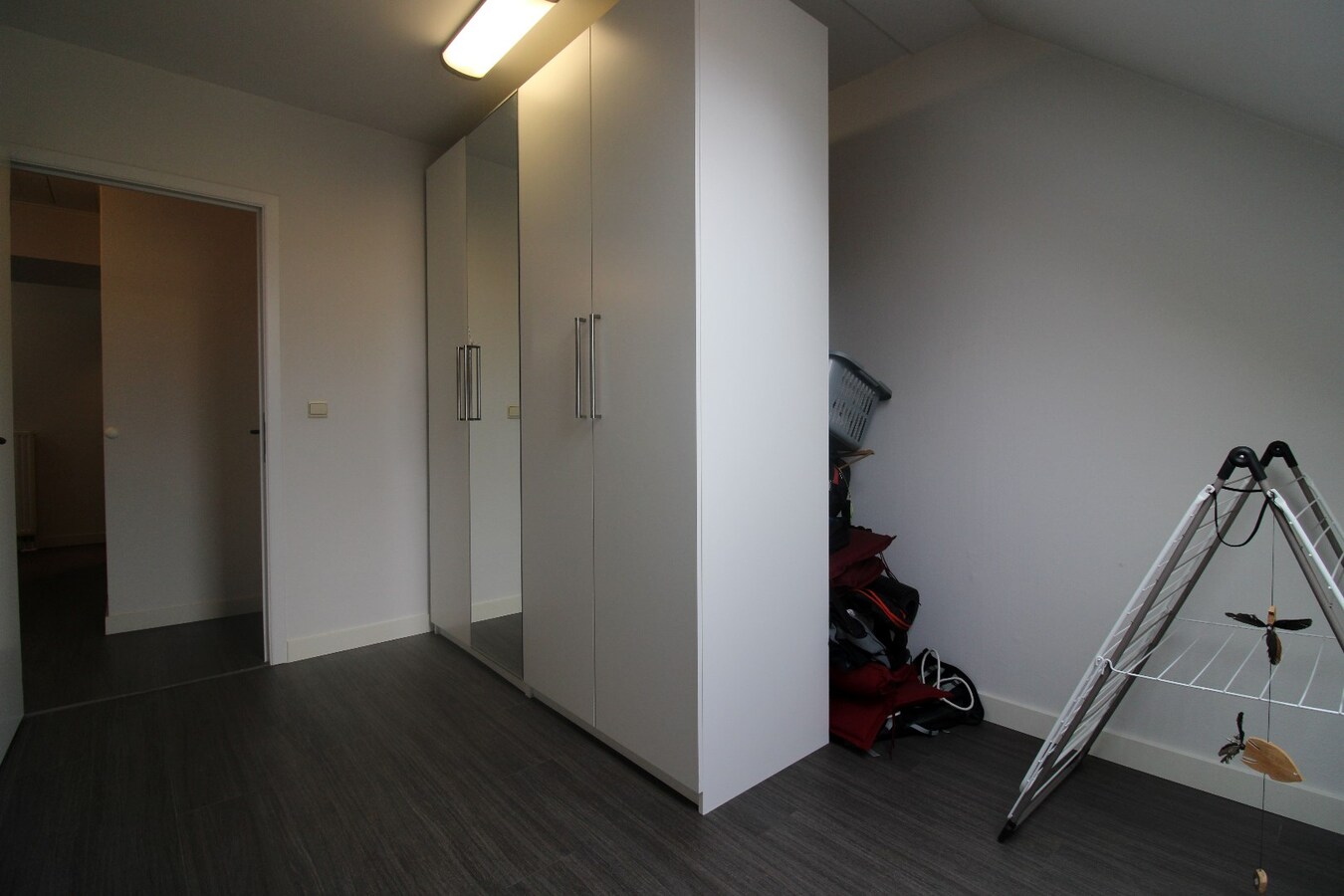 Centraal gelegen appartement met terras, kelderberging en staanplaats 