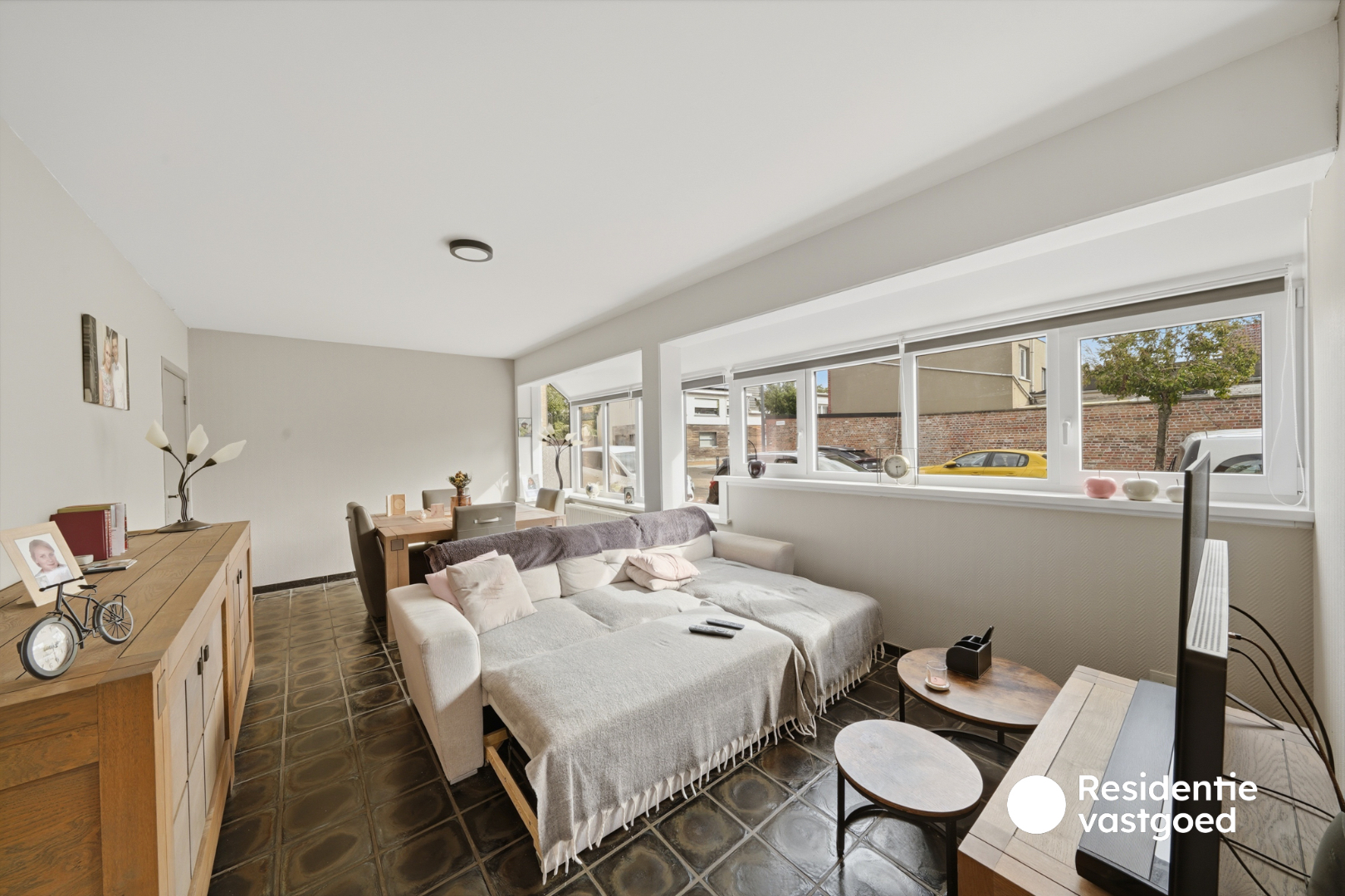 Opbrengsteigendom met 3 appartementen, garage en zonnig terras 