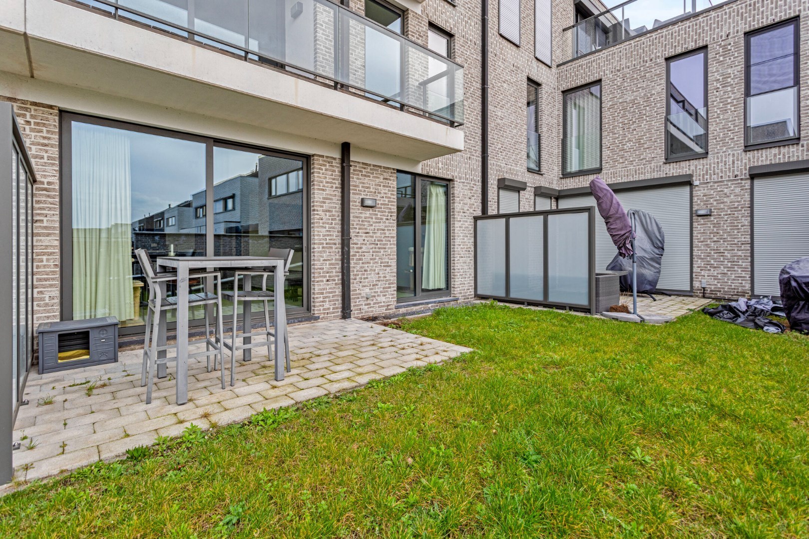 Lichtrijk nieuwbouwappartement met 3 slaapkamers, tuin, terras, kelderberging en 2 autostaanplaatsen - EPC 36 kWh/m² -bewoonbare opp. 115 m² 