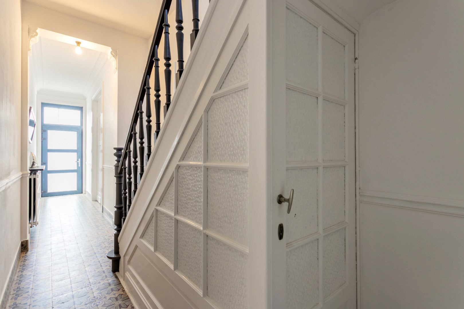 Handelshuis met woongedeelte, garage en tuin 