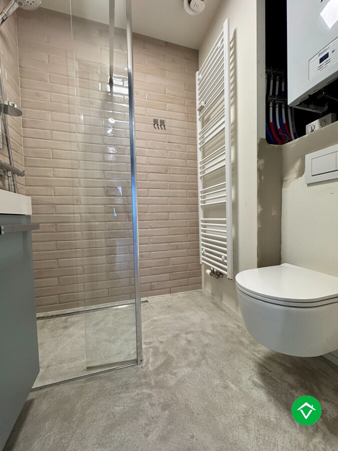 Instapklaar appartement met 2 slaapkamers en garage te Gent 