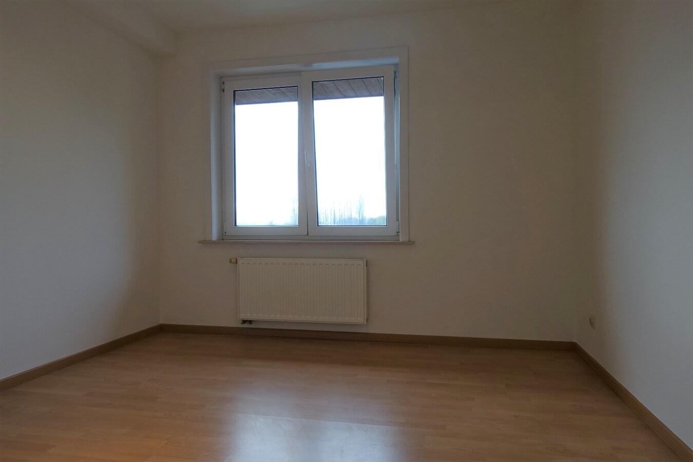 Lichtrijk duplex-appartement met garage in het centrum 