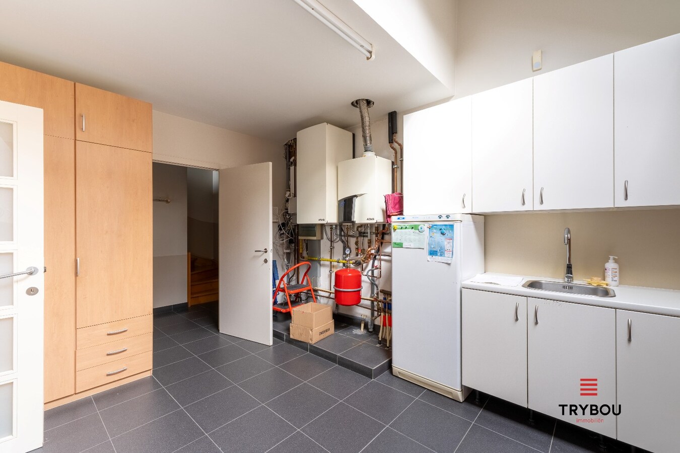 Te koop handelszaak + woning 