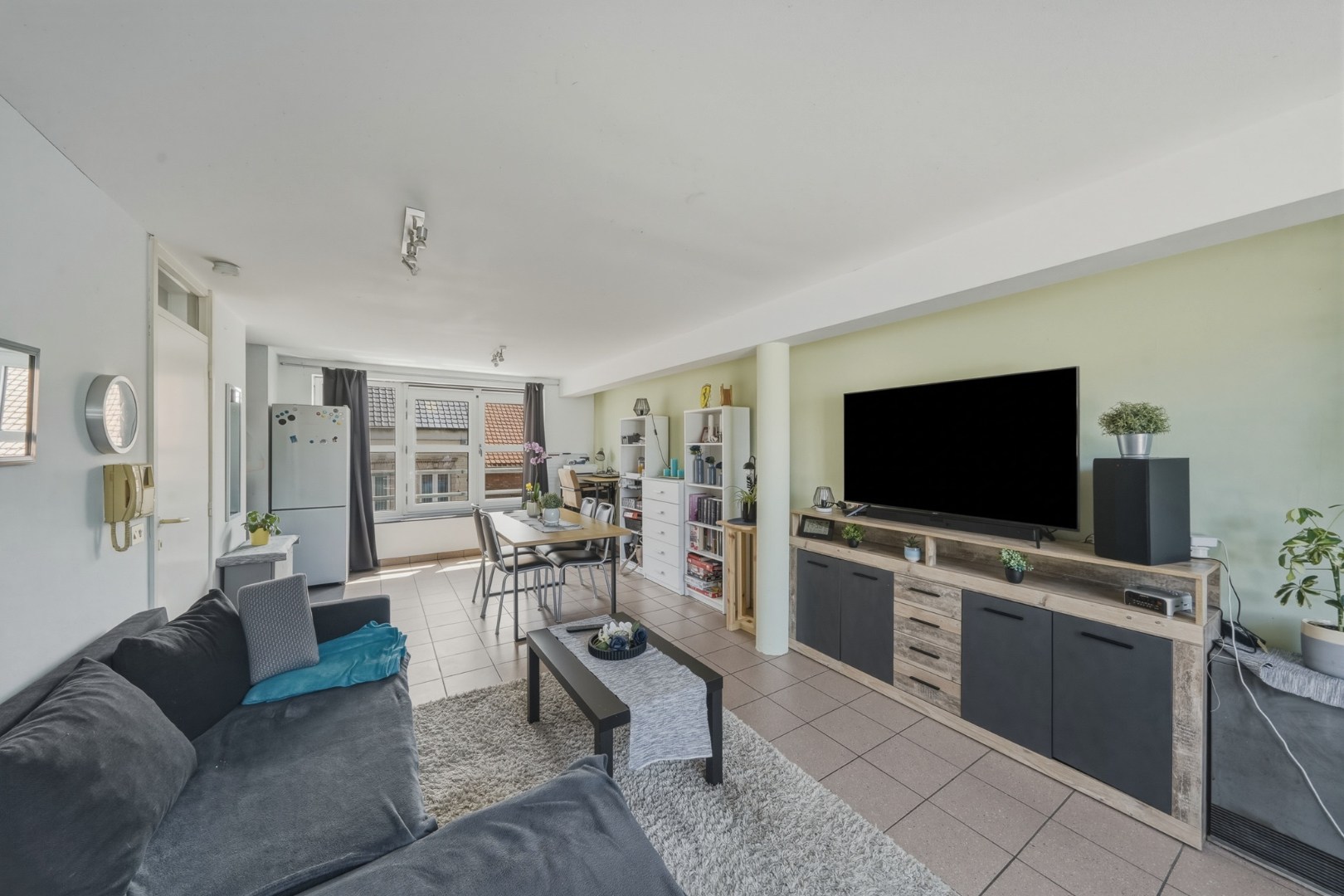 Verhuurd appartementsgebouw met 3 woonentiteiten 