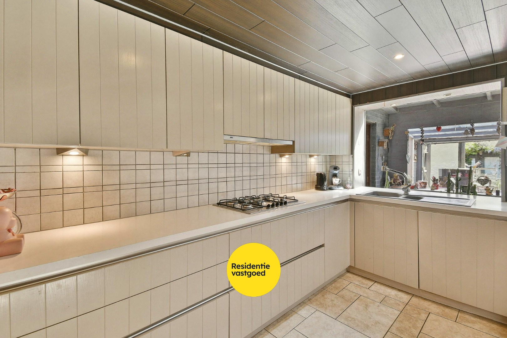Woning met drie slaapkamers, garage en zonnige tuin 