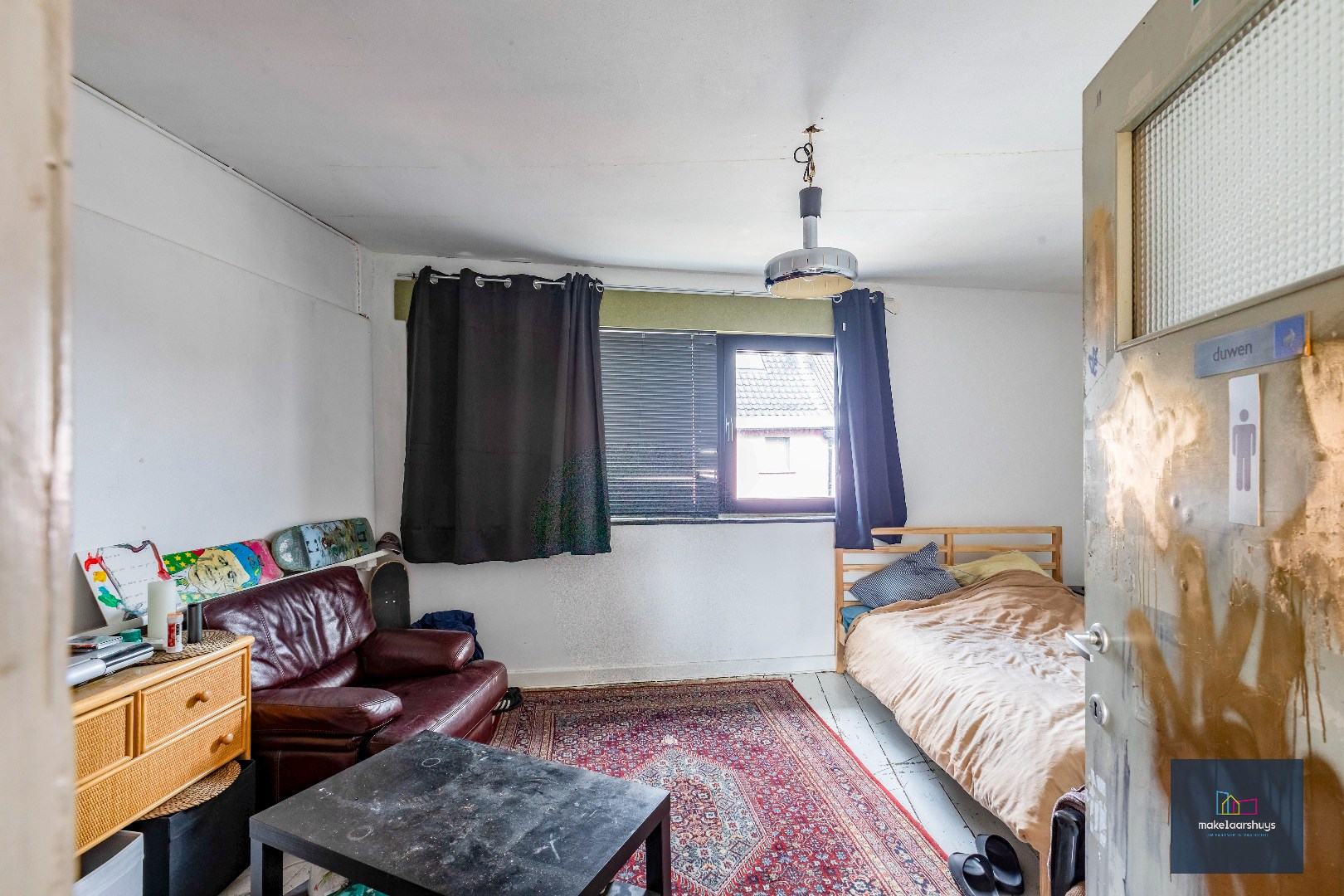 Woning met 3 slaapkamers en verrassende tuin met bijgebouwen 