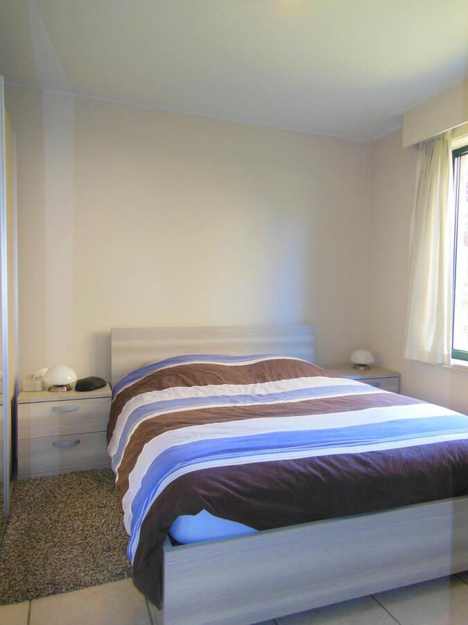 Gezellig gelijkvloersappartement met zonnige tuin en garage 