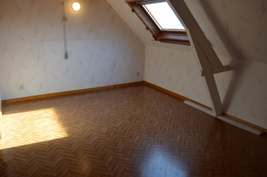 Rijwoning met 2 slpks en tuin te Adegem 