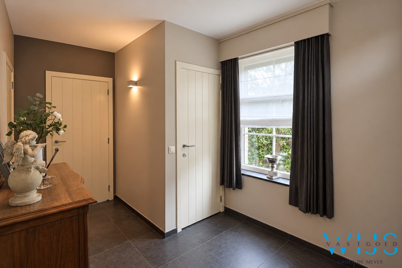 Ruime halfopen bebouwing met vier slaapkamers in Ertvelde 