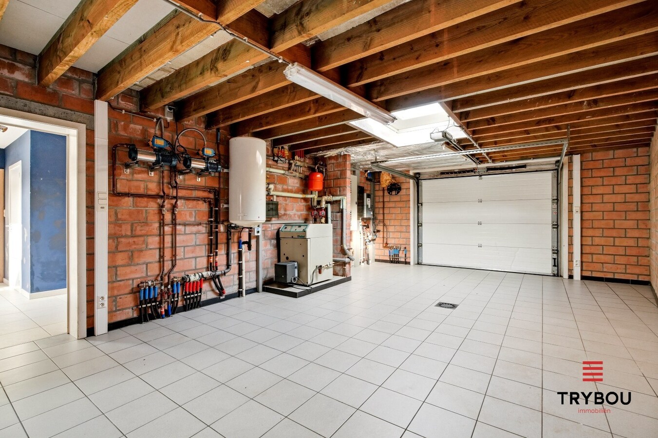 Ruime halfopen woning met 5 slaapkamers te koop in Werken met garage en ruime tuin! 