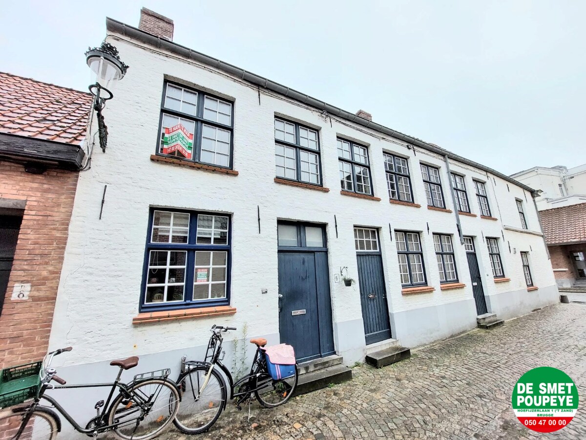 Rijwoning met gemeenschappelijk terras 