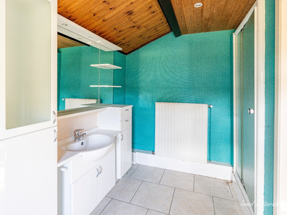 Rural villa with multifunctional outbuilding on approximately 51 acres in Bilzen 