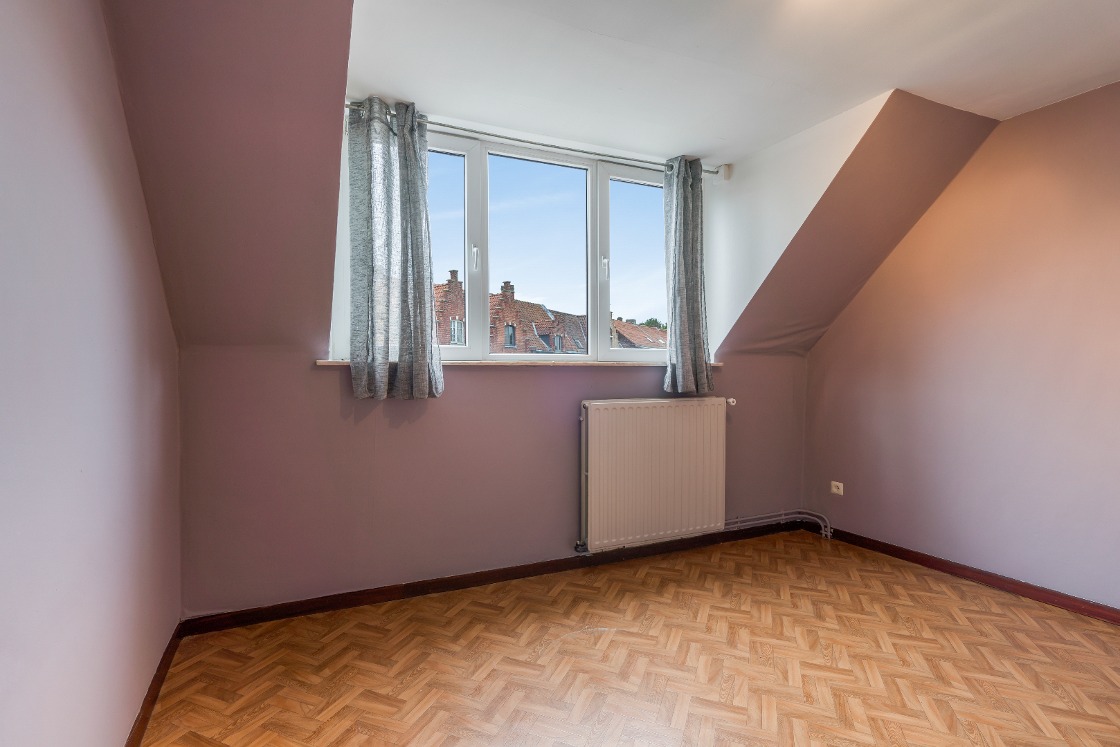 ONDER OPTIE - Knusse woning in Brugge centrum 