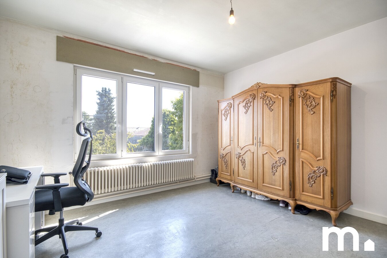 Half open gezinswoning met ruime tuin en garage te koop ! 