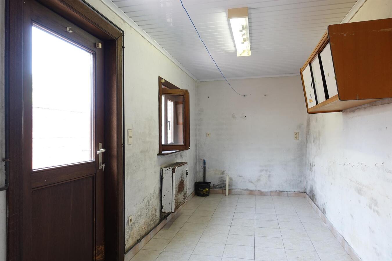 Rijwoning met tuin in centrum Eernegem 