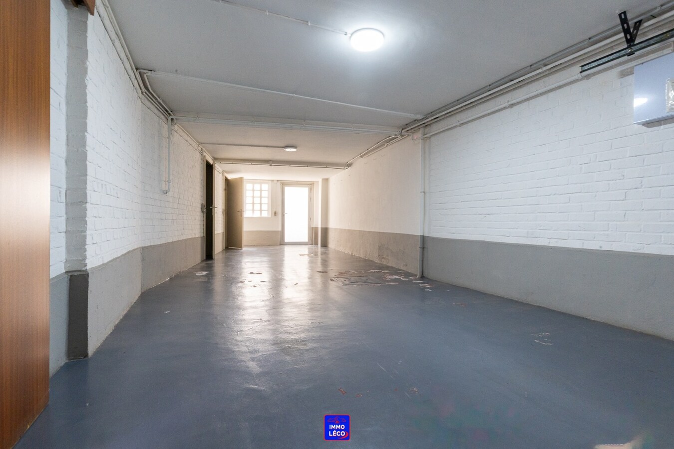 Maison "Bel-Etage" avec double garage, jardin, en plein centre-ville ! 