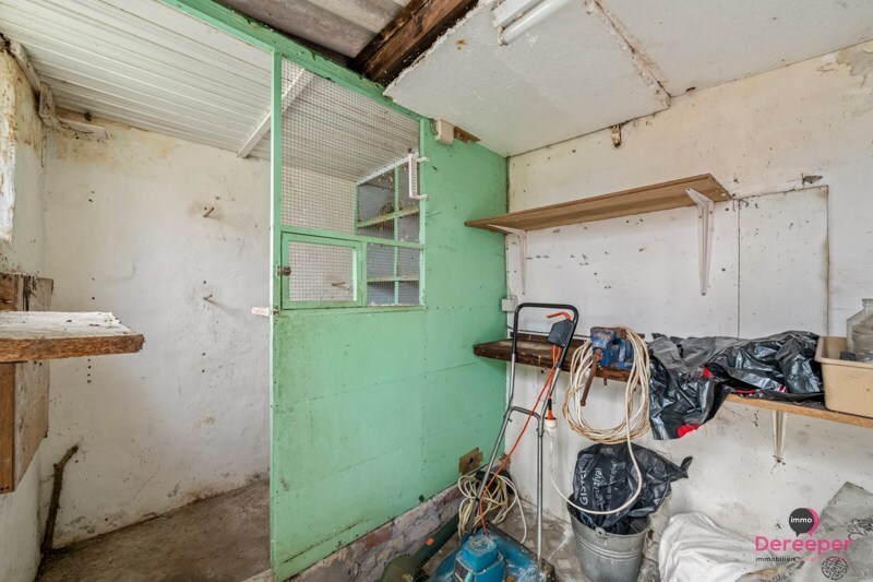 Te renoveren rijwoning op centrale ligging met leuke zuidgerichte tuin 