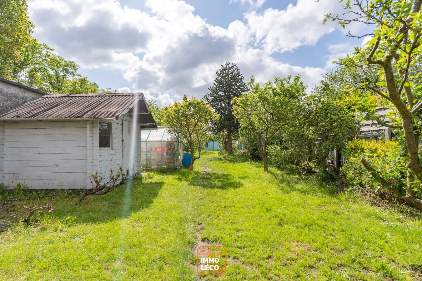 Double maison sur 949m² avec garage ! 