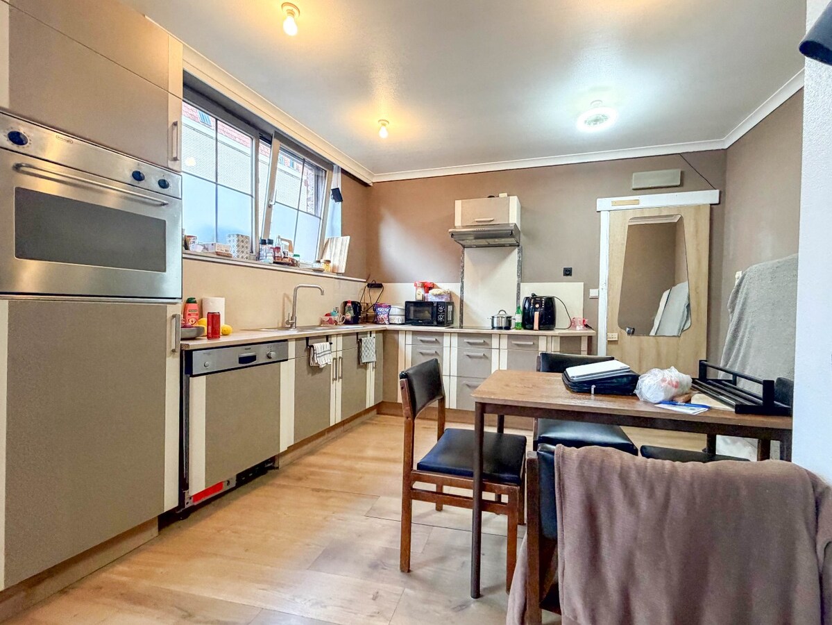 UNIEK en ruime KARAKTERVOLLE  woning met handelspand nabij de Grote Markt ! 