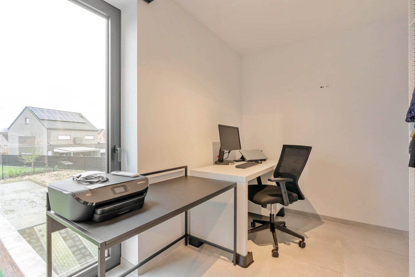 Recent duplex appartement met 2 slaapkamers en garage. 