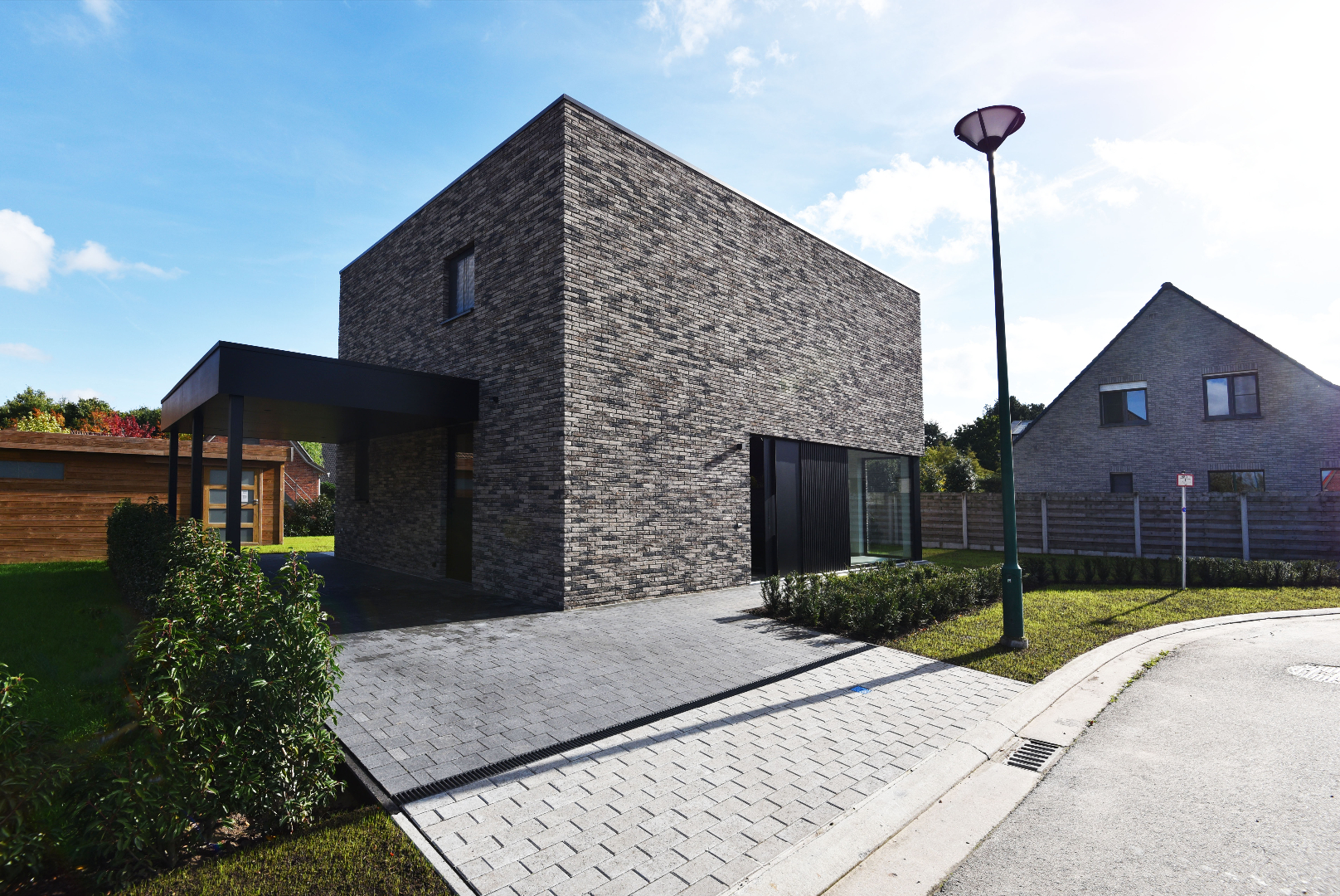 NIEUWBOUW open bebouwing (BEN-woning) met 3 slpks, carport, tuinhuis en tuin te Adegem 