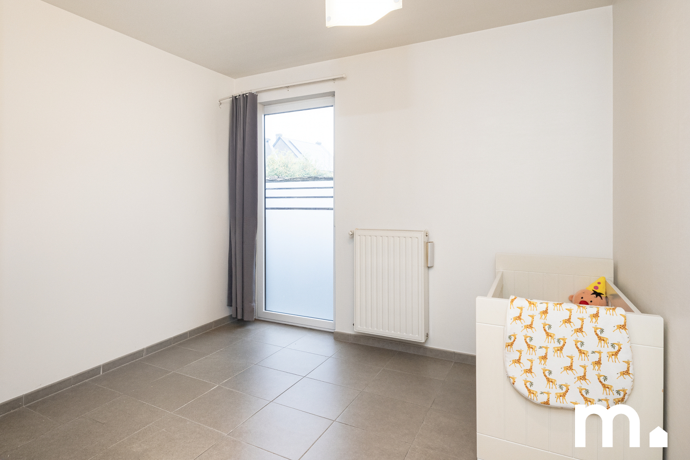 Instapklaar gelijkvloers appartement aan het Leopold III park in Kortrijk te koop ! 
