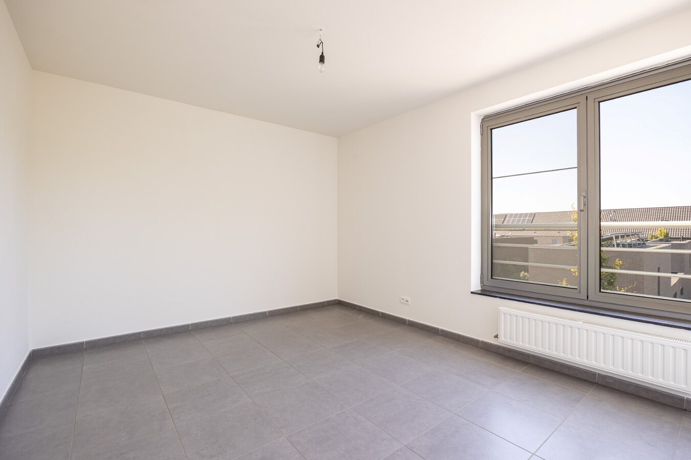 Recent energiezuinig appartement met 2 slpk. en zeer ruim terras te Niel! 