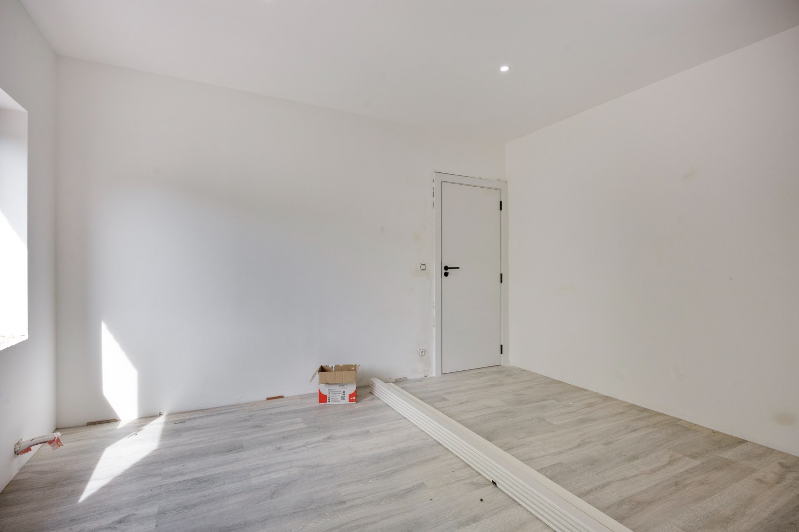 Gerenoveerd handelshuis met aangename tuin en garage op goede ligging in Herent 
