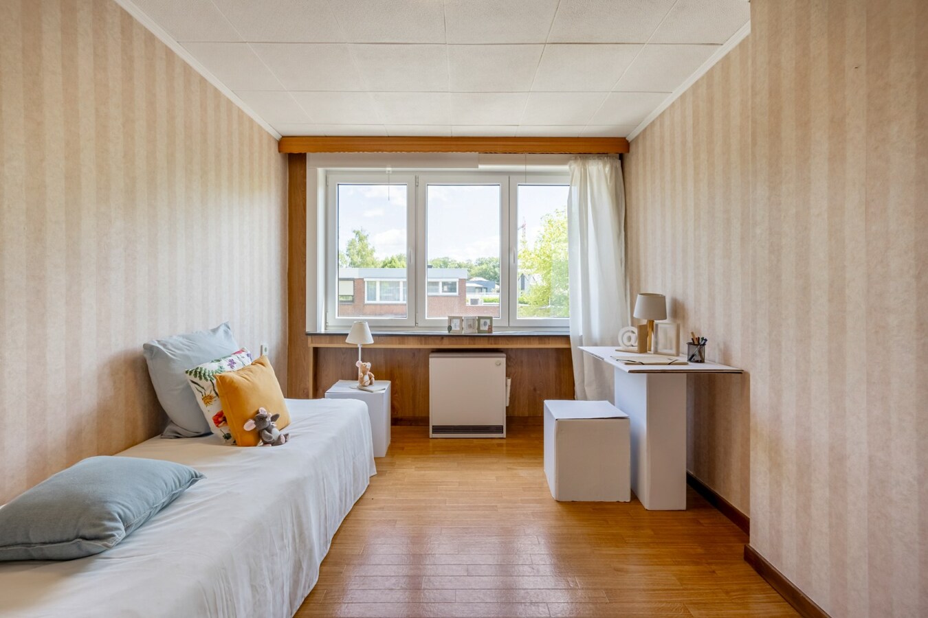 Ruime instapklare woning met 4 slaapkamers, tuin en garage. 