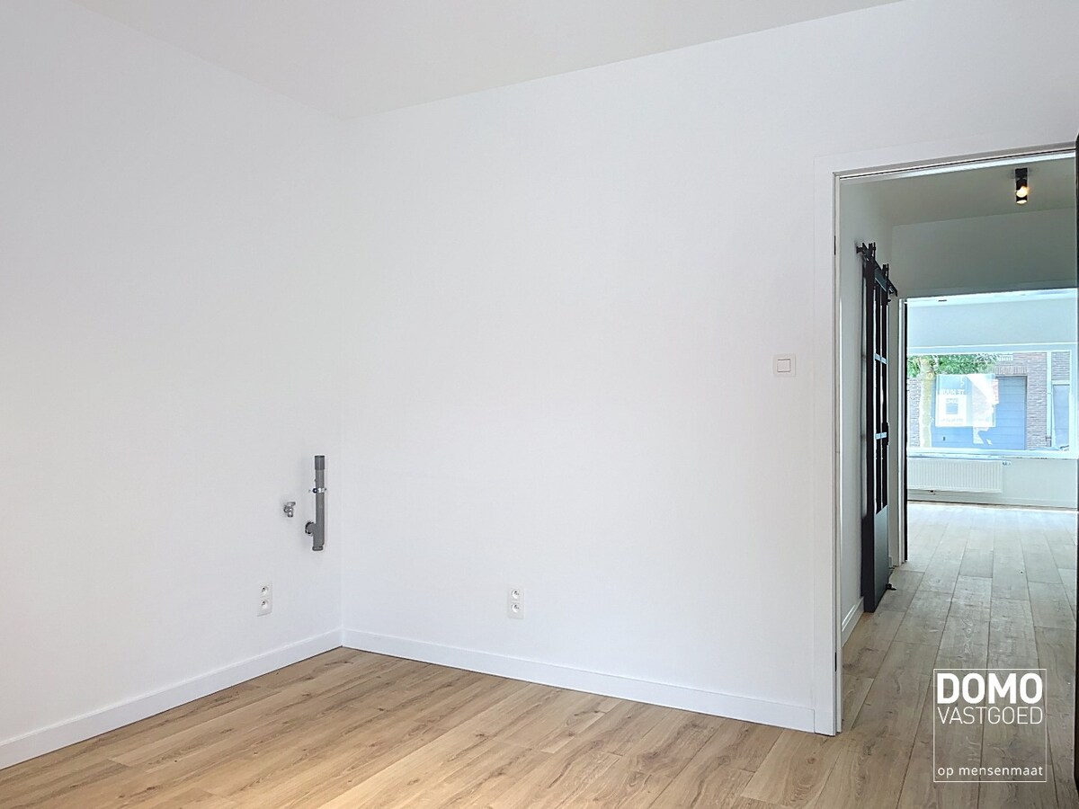 VOLLEDIG GERENOVEERD APPARTEMENT MET TERRAS EN GARAGE TE HASSELT 