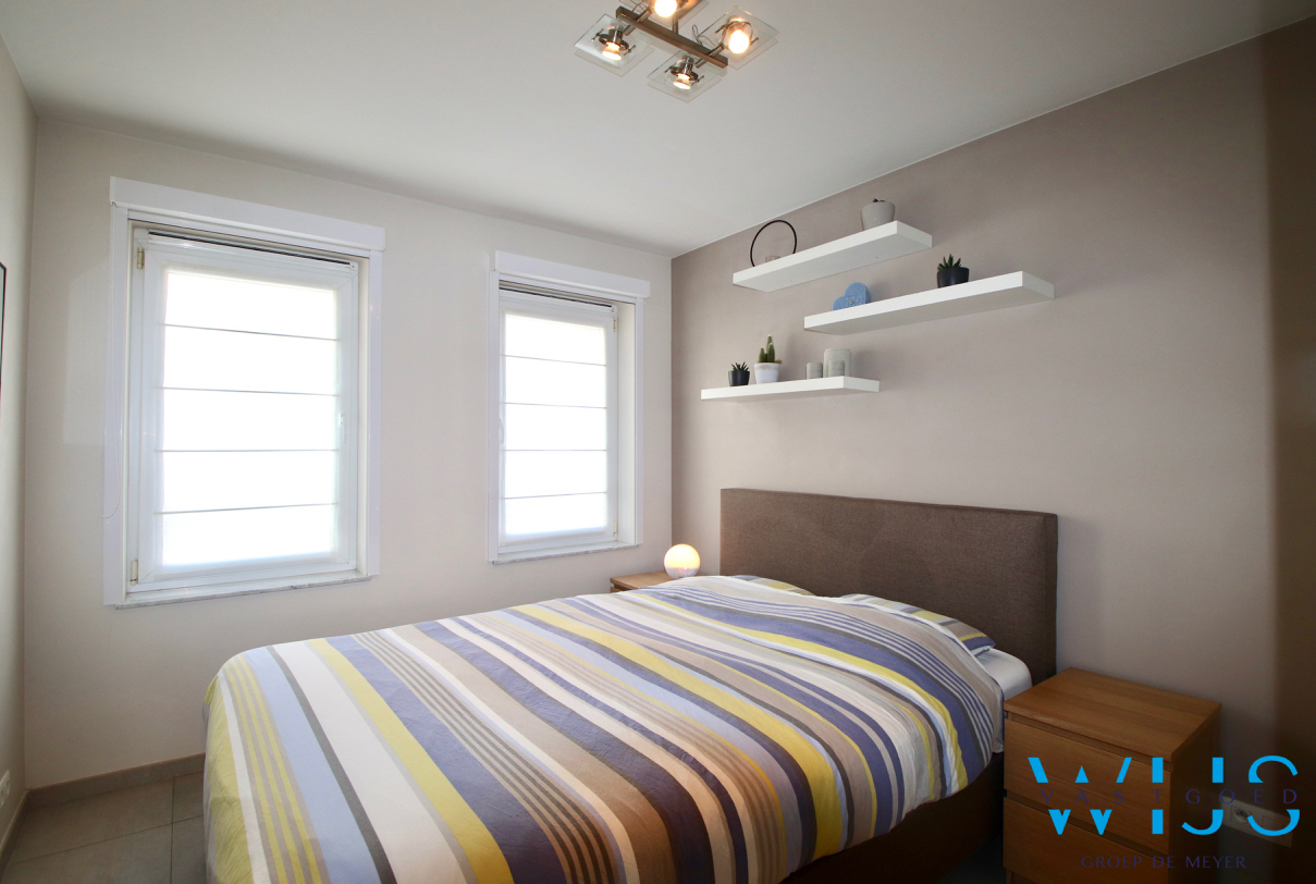 Gelijkvloers appartement met zonnige tuin &amp; dubbele garage te Sint-Laureins ! 