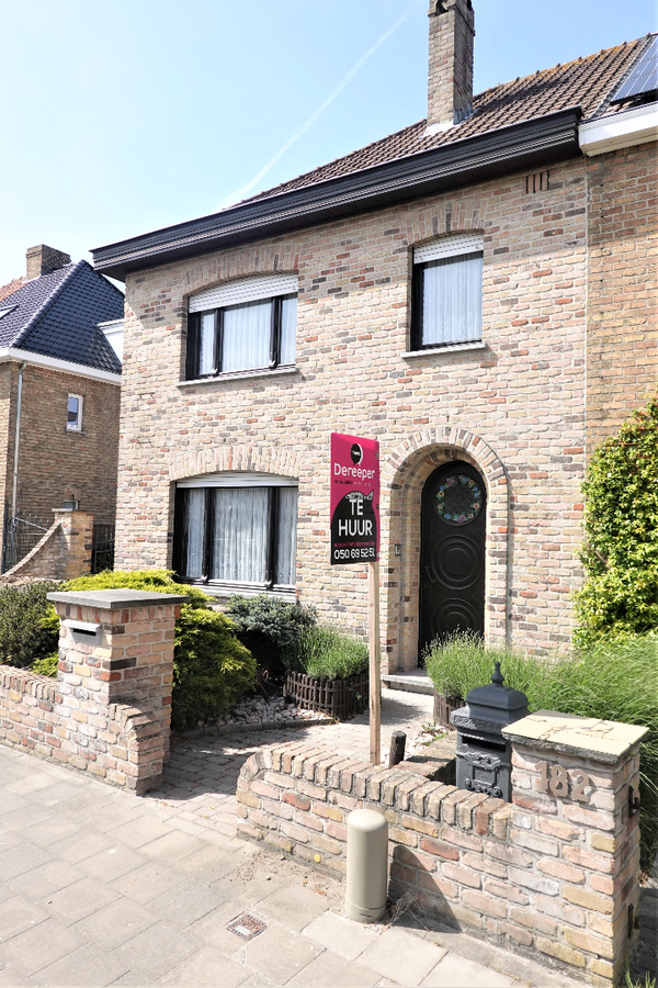 Halfopen woning op gunstige ligging ( zonder loods ) 