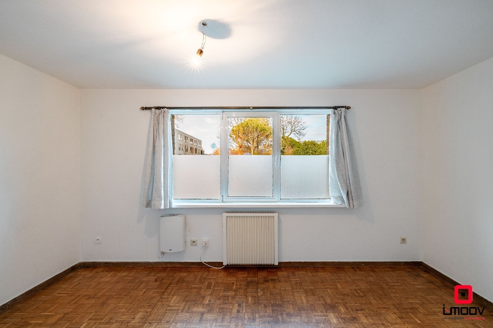 Eénslaapkamerappartement met optie voor één of twee afgesloten garageboxen op TOPLOCATIE aan Gent-Sint-Pieters 